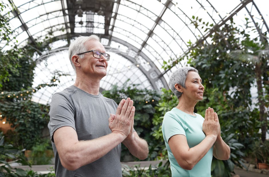 Senior couple enjoying a yoga session indoors, promoting harmony and healthy lifestyle
